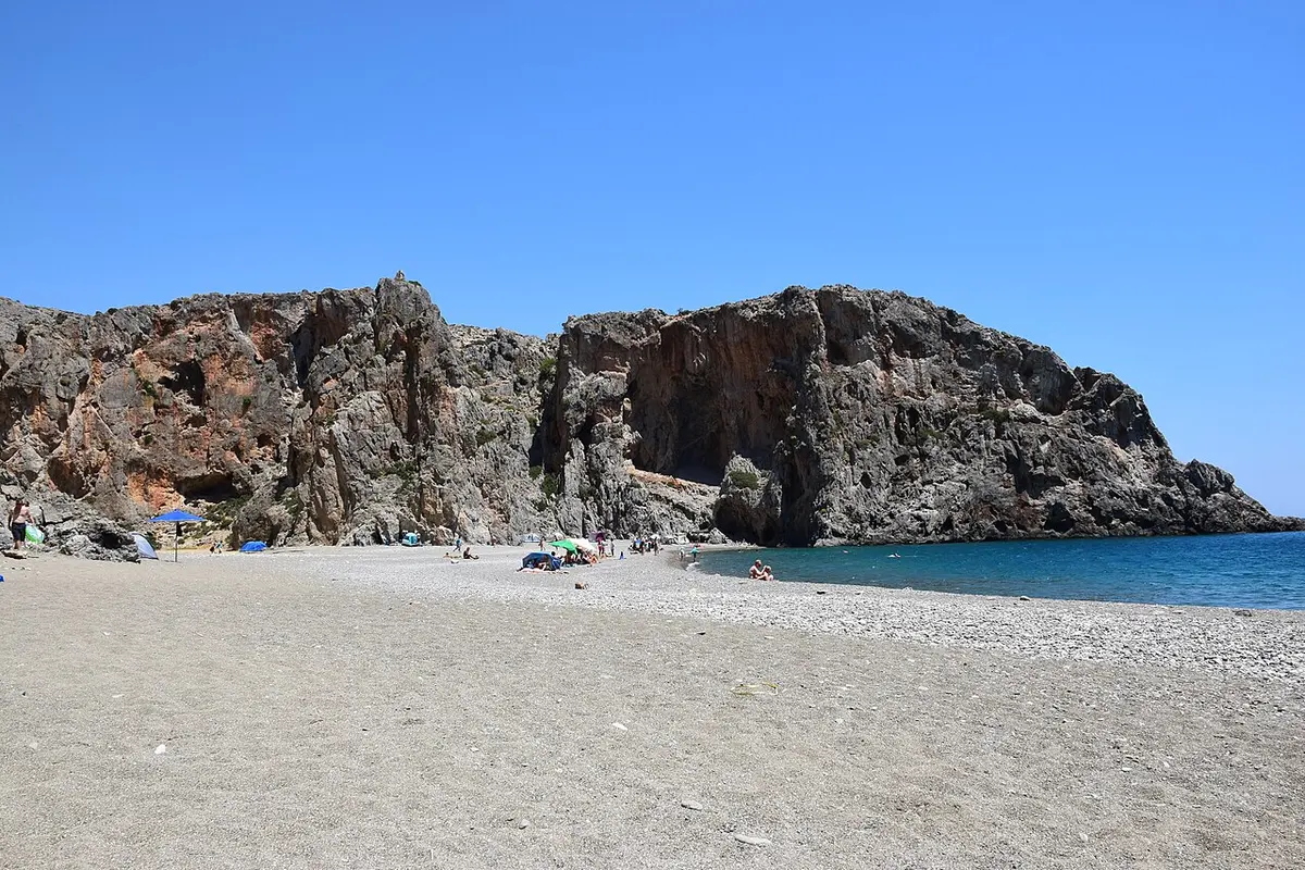 Agiofarago Beach, Crete, Agiofarago, Heraklion, south Crete - pebbles and dark sand at the foot of a narrow gorge