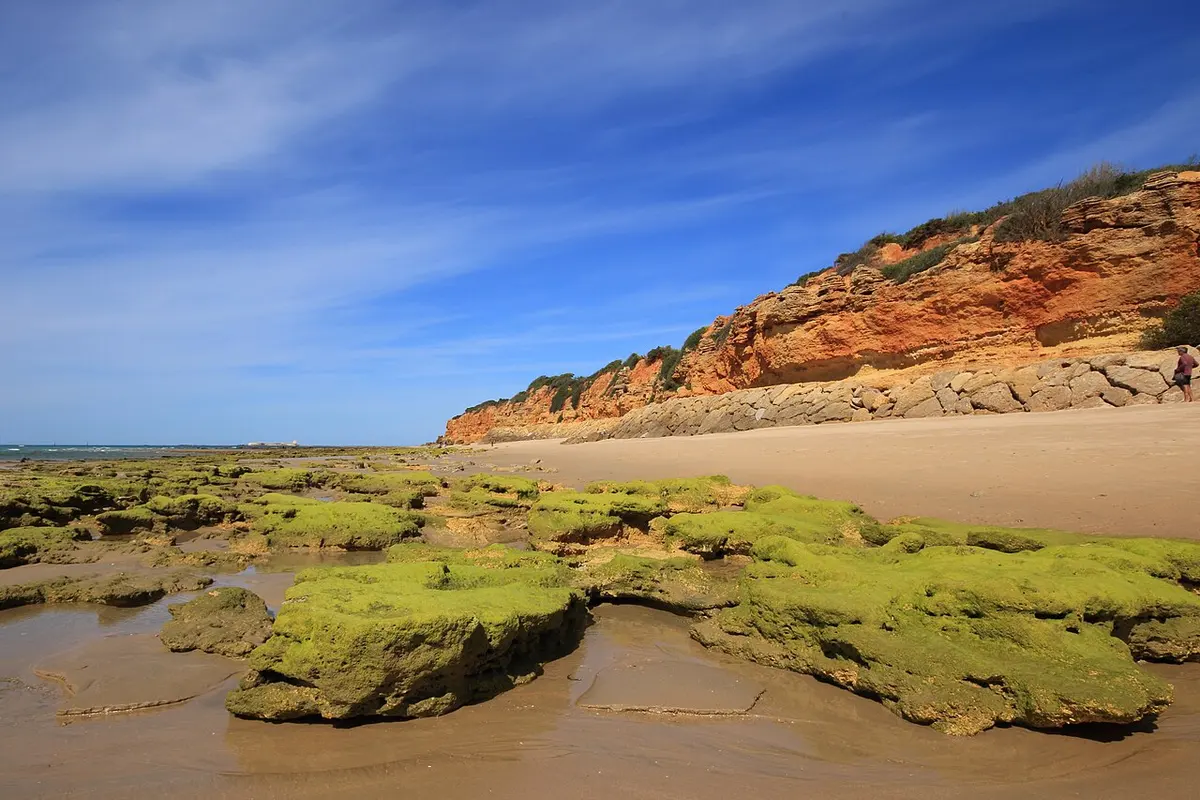 Playa de la Barrosa, Chiclana de la Frontera, Andalusia - long atlantic beach with red cliffs
