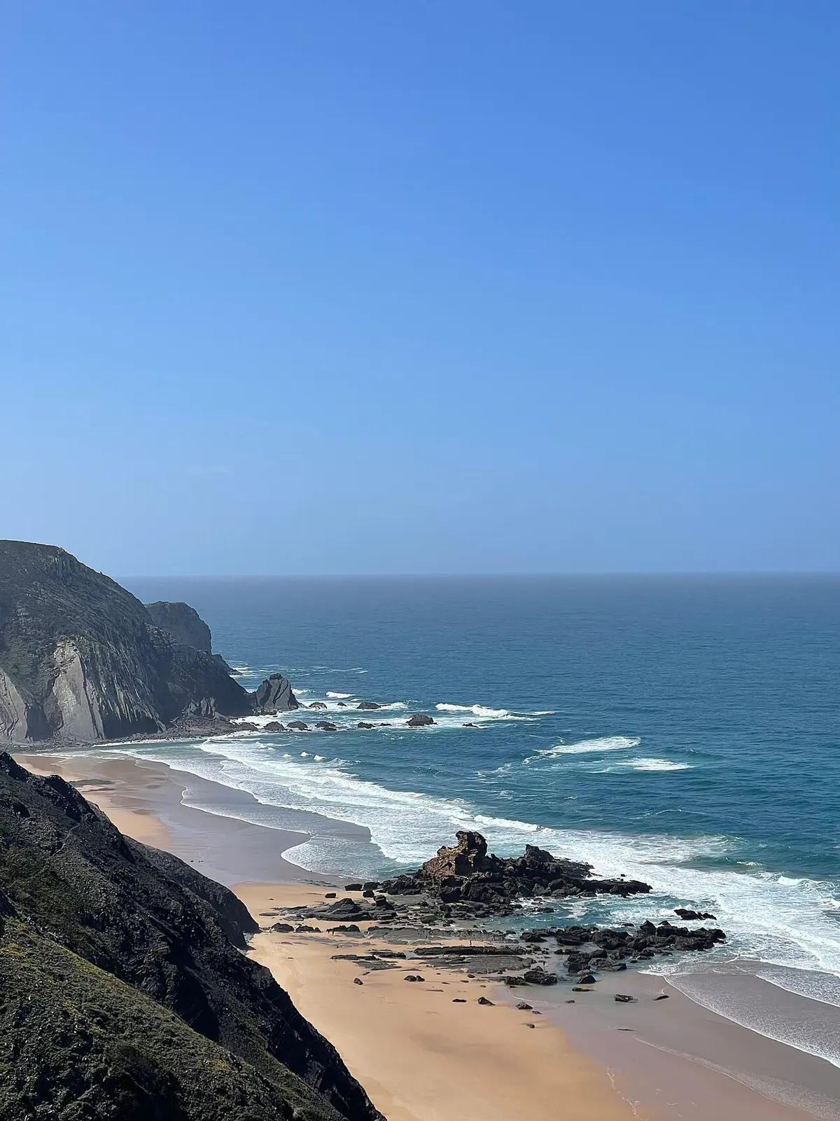 Praia do Castelejo, Vila do Bispo, Algarve - wild west-coast beach under dark cliffs