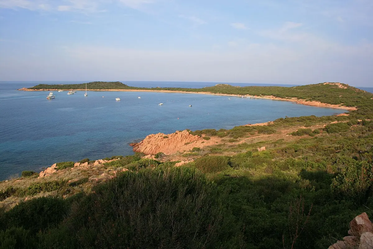 Spiaggia di Capo Coda Cavallo, Capo Coda Cavallo, San Teodoro, Sardinia - wild curved bay of pale sand and red rocks in north-east sardinia
