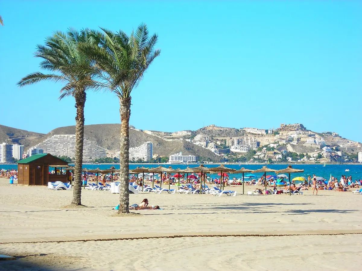 Playa San Antonio, Cullera, Cullera, Valencia - wide sand beach below a castle and a mountain