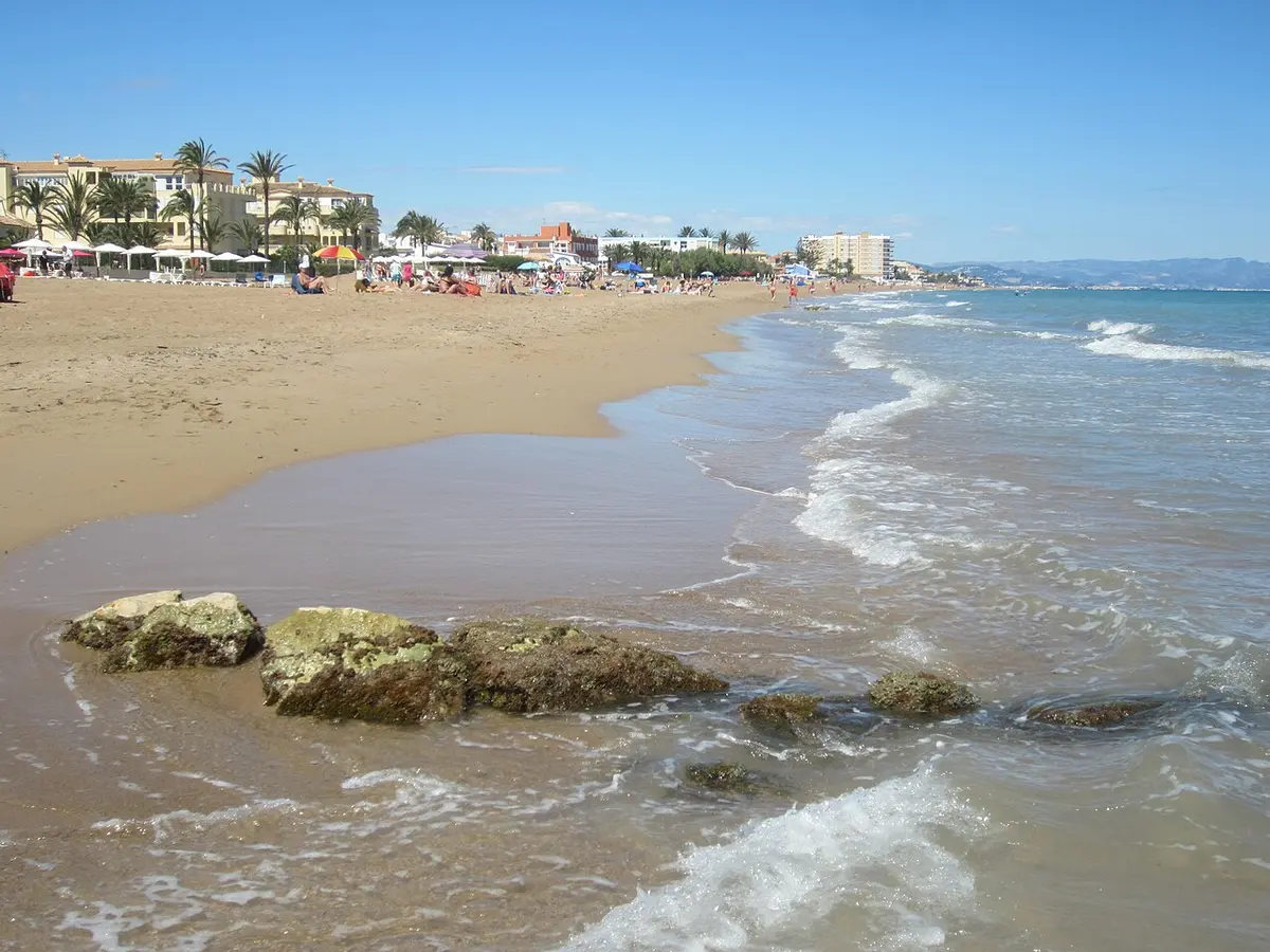 Playa de Les Marines, Denia, Denia, Costa Blanca - long flat beach with dark sand and calm water