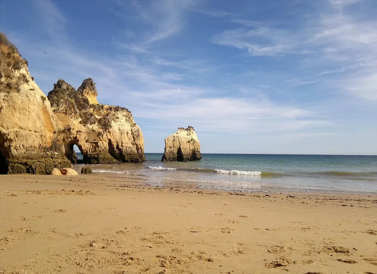 Praia dos Tres Irmaos, Alvor, Algarve - sandstone arches and caves at low tide