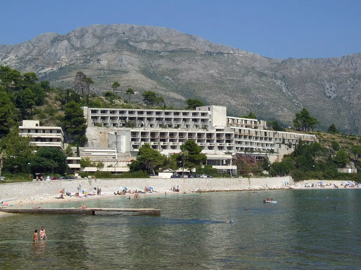Kupari Beach, Zupa dubrovacka, near Dubrovnik - pebble beach below ruined yugoslav-era hotels