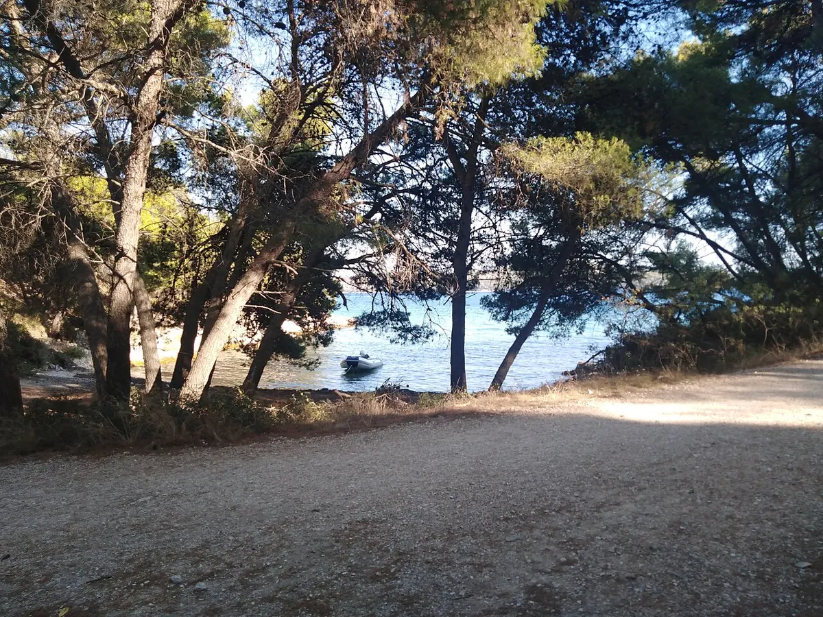 Medena Beach, Seget Vranjica, Medena, Seget Vranjica, Split-Dalmatia - pine-shaded pebble beach west of trogir in dalmatia