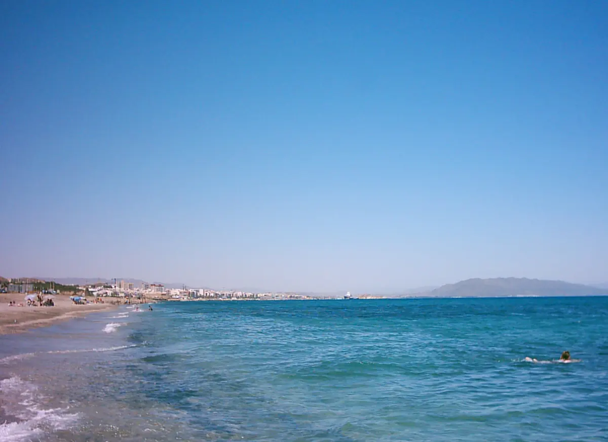 Playa de Mojacar, Mojacar, Almeria - long sand beach below a white hill village