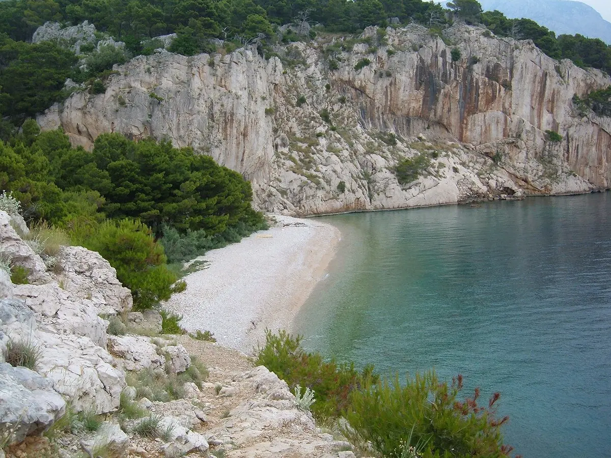 Nugal Beach, Makarska, Dalmatia - hidden pebble cove under limestone cliffs