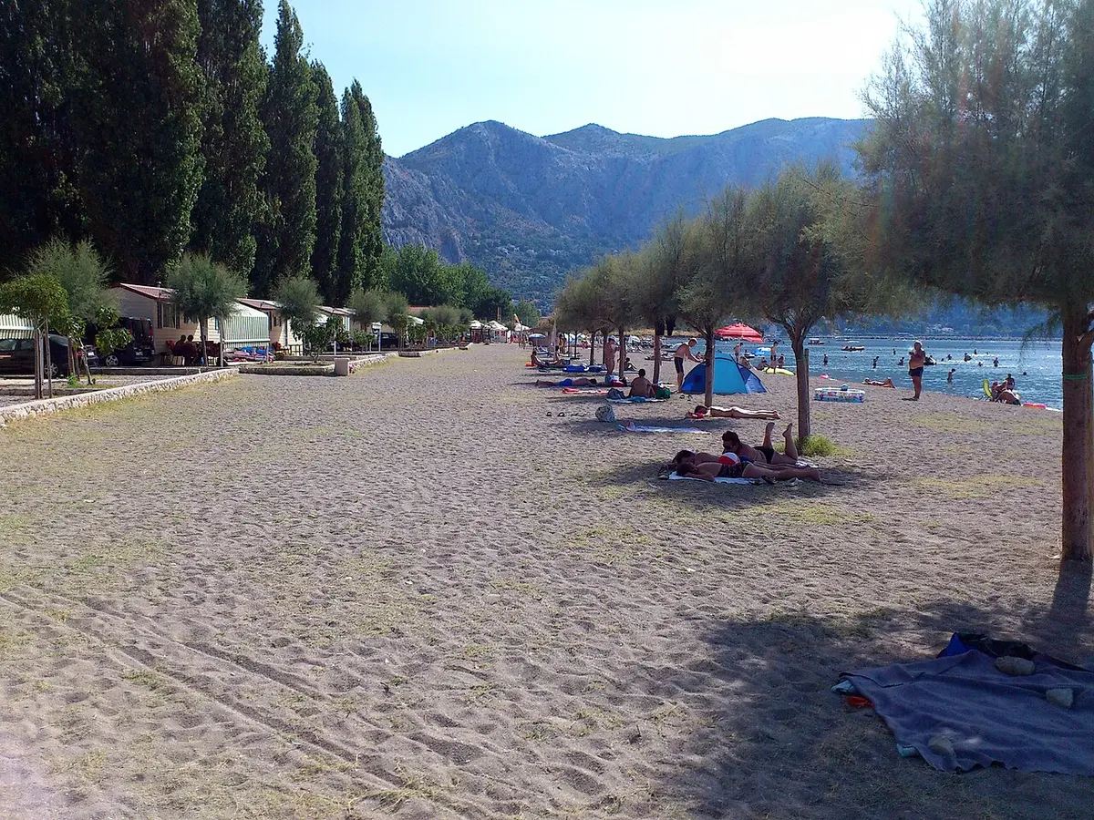 Omis Beach, Omis, Dalmatia - pebble beach at the mouth of the cetina river between mountains
