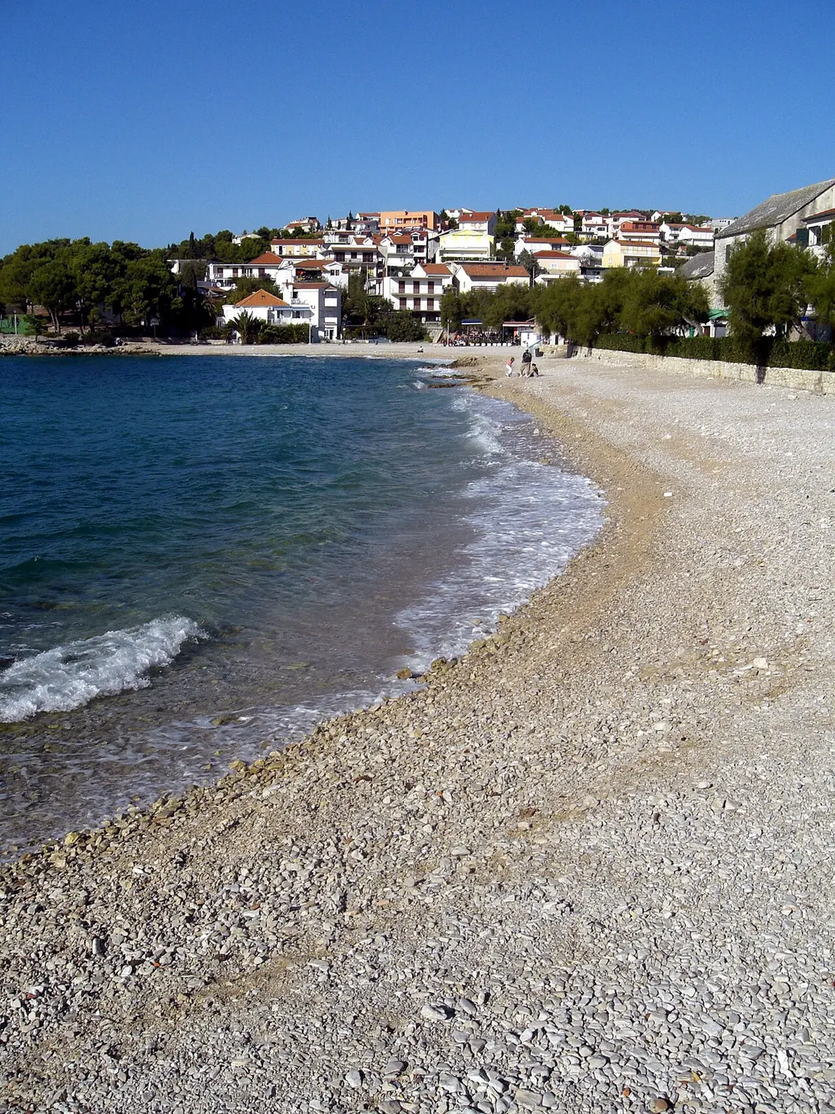 Primosten Beach, Primosten, Dalmatia - pebble coves around a walled island town