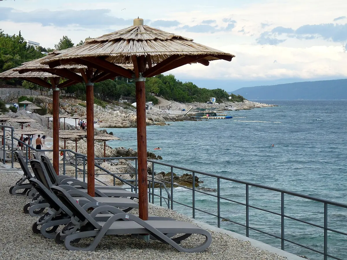 Girandella Beach, Rabac, Istria - pine-shaded pebble beach in rabac, istria
