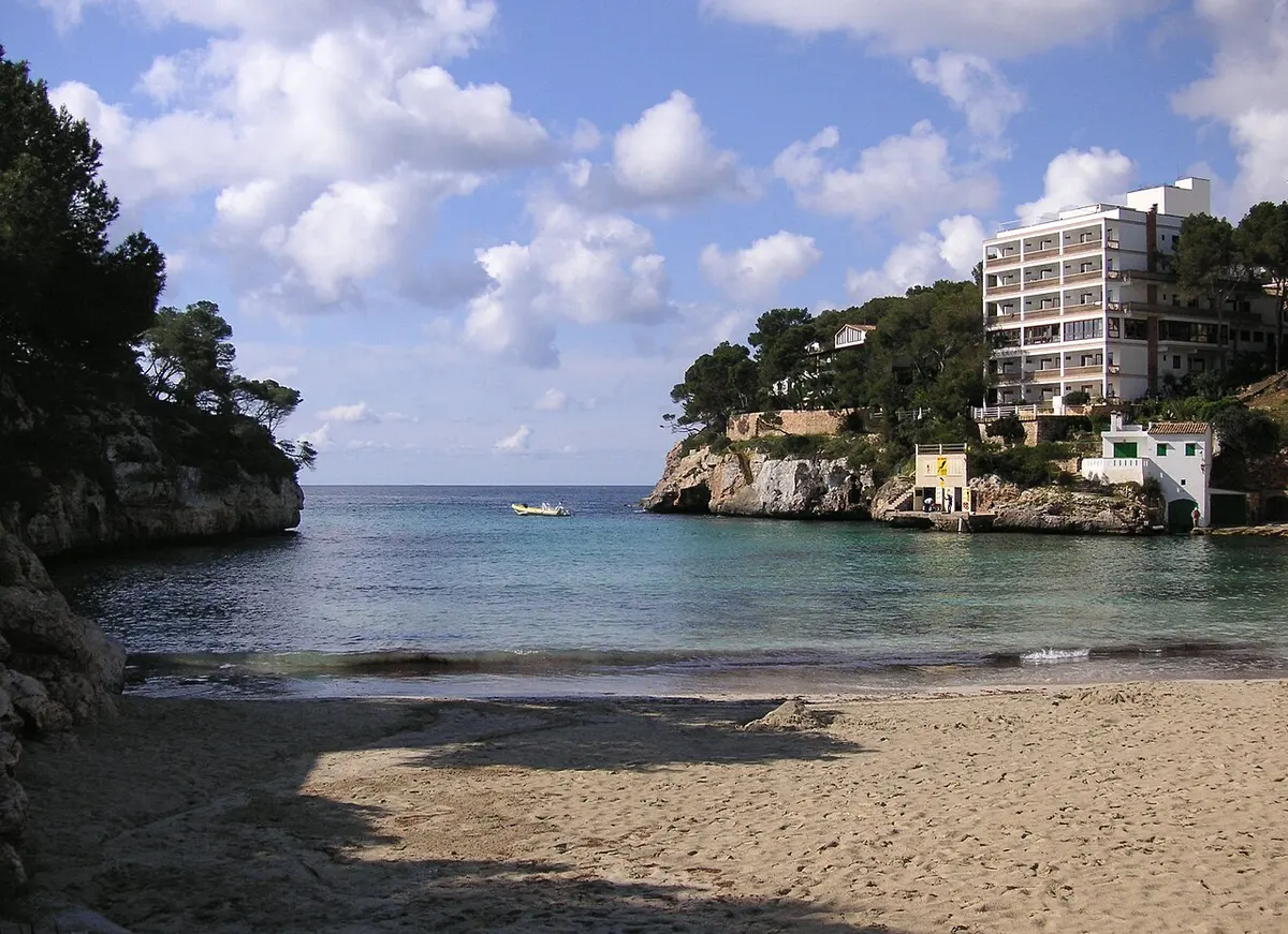 Cala Santanyi, Santanyi, Mallorca - sheltered sandy cove with a natural arch nearby