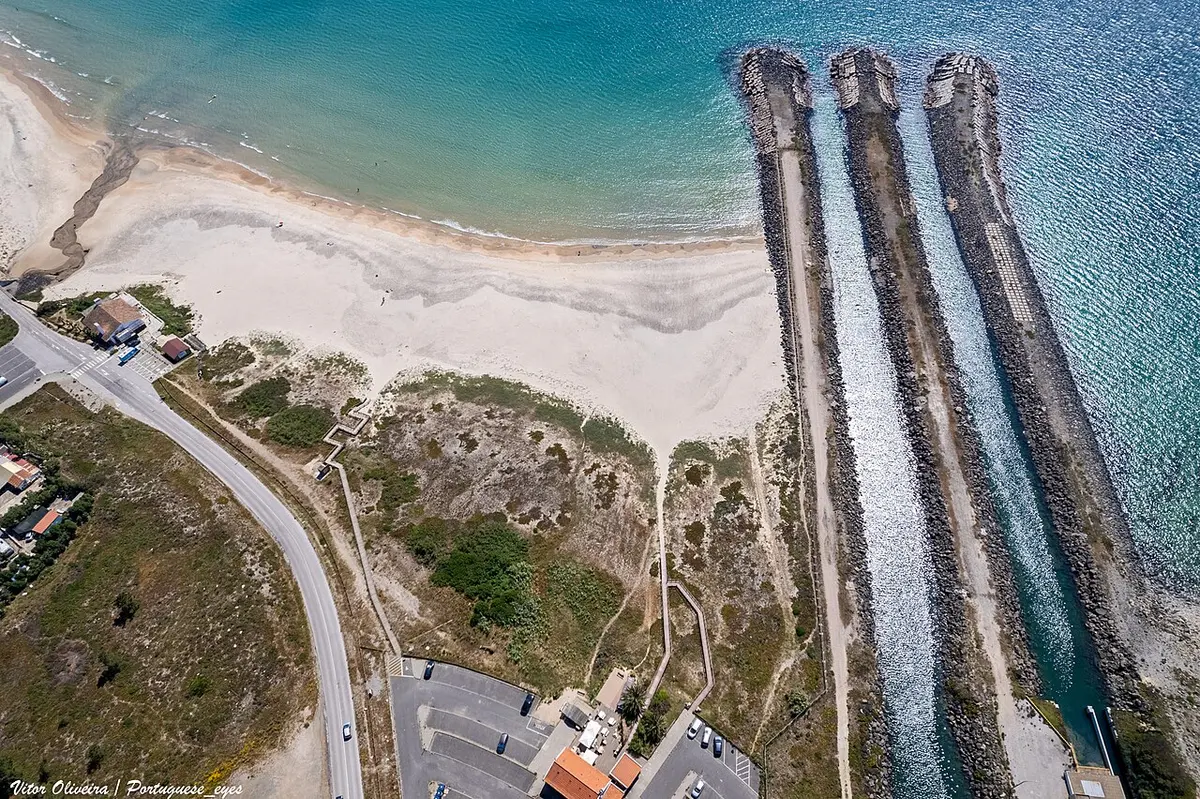 Praia de Sao Torpes, Sines, Sao Torpes, Sines, Alentejo - sandy beach behind a breakwater on the alentejo coast