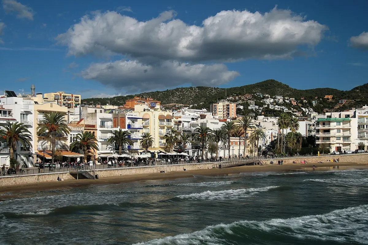 Sitges Beach, Sitges, Catalonia - golden town beach with a church on the point