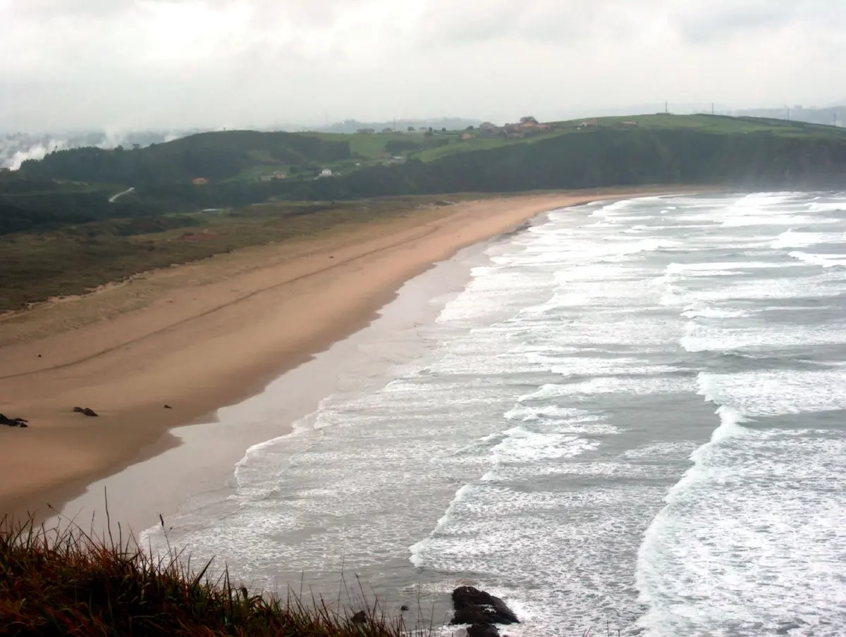 Playa de Xago, Xago, Gozon, Asturias - wide golden atlantic beach with dunes and surf